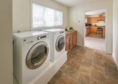Summit by Morrison interior view of laundry room and kitchen