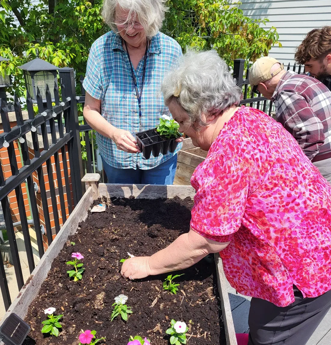 Rebecca-planting with Terri