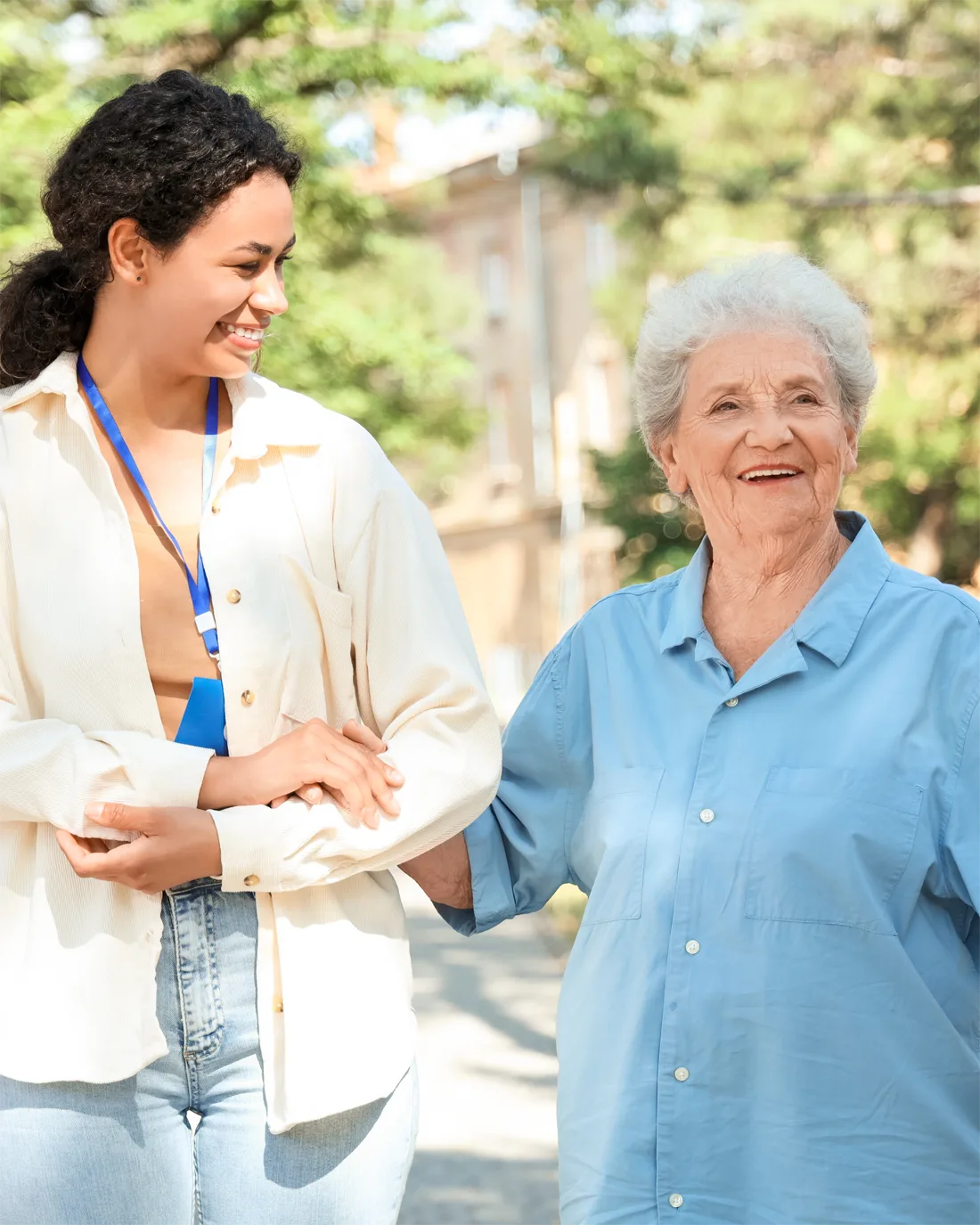 caretaker-and-elder-walking-outside